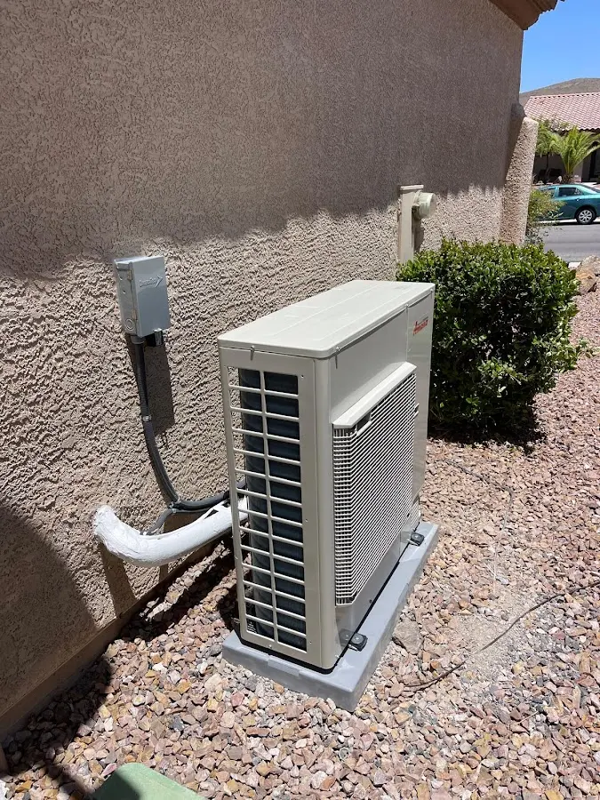 Residential air conditioning condenser unit in McSwain
