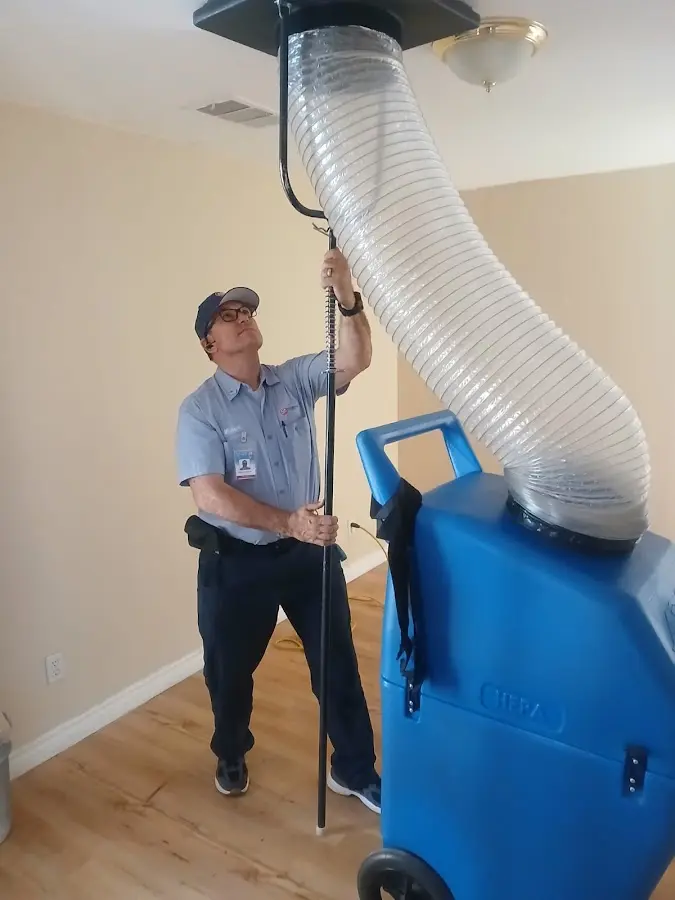HVAC Installation technician using HEPA equipment in McSwain